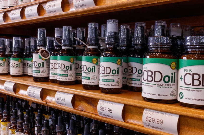 indianapolis circa february 2019: various cbd oil products. the popularity of cbd oil as a medicinal product has skyrocketed iv